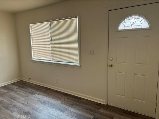 6688 Yucca Ave Unit 29, Palms, CA 92277 - entryway featuring dark wood-type flooring and baseboards