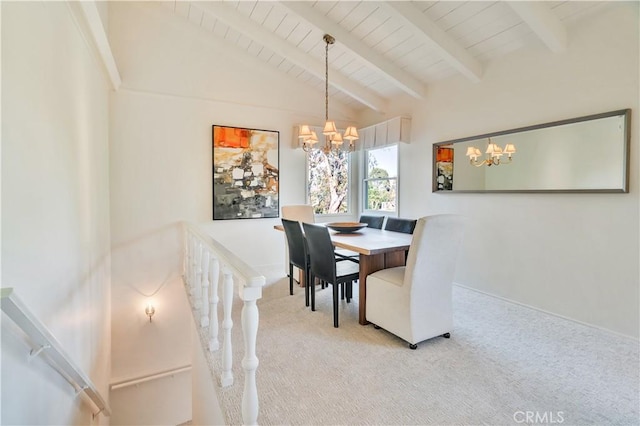 dining space featuring a chandelier, carpet floors, wooden ceiling, and baseboards