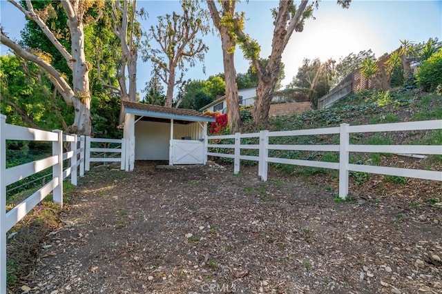 gate with an outdoor structure, an exterior structure, and fence