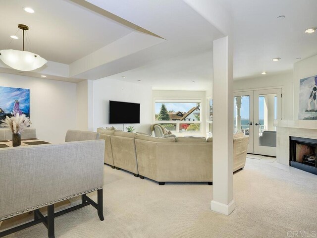1099 1st St Unit 217, Coronado, CA 92118 - living area featuring light colored carpet, recessed lighting, and french doors