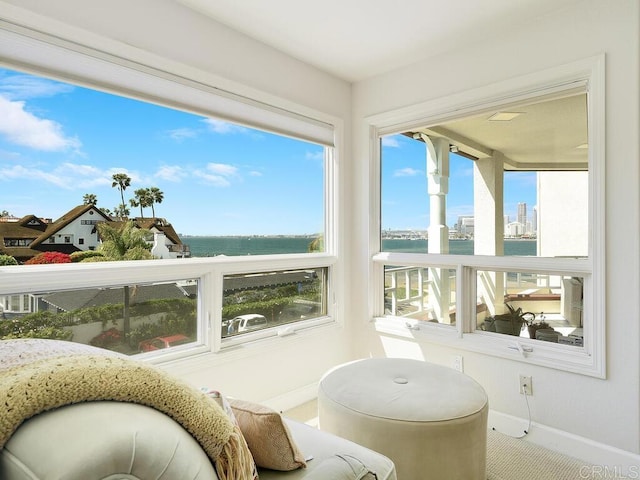 1099 1st St Unit 217, Coronado, CA 92118 - sunroom featuring baseboards and a water view