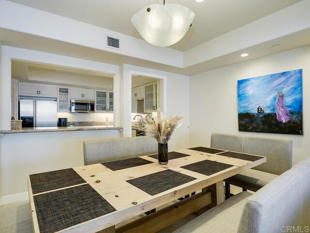 1099 1st St Unit 217, Coronado, CA 92118 - dining area with recessed lighting