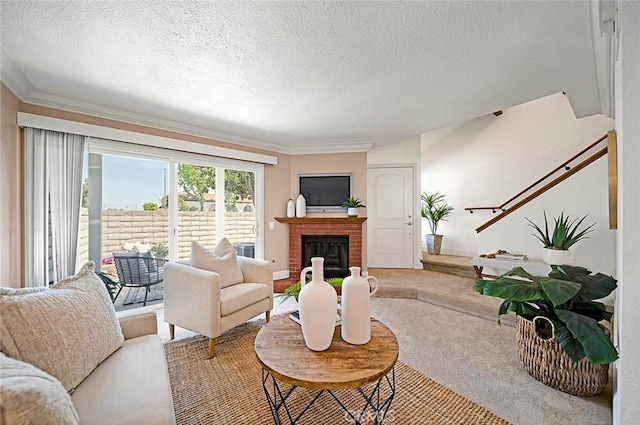 173 N Magnolia Ave Unit A, Anaheim, CA 92801 - carpeted living room featuring a textured ceiling, a fireplace, and crown molding