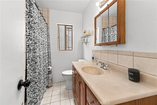 115 N Magnolia Ct, Compton, CA 90220 - full bath featuring toilet, backsplash, vanity, tile patterned flooring, and a shower with curtain