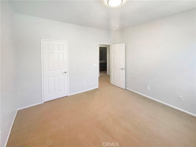 8424 Monique Ct, Riverside, CA 92508 - unfurnished bedroom featuring light carpet and baseboards