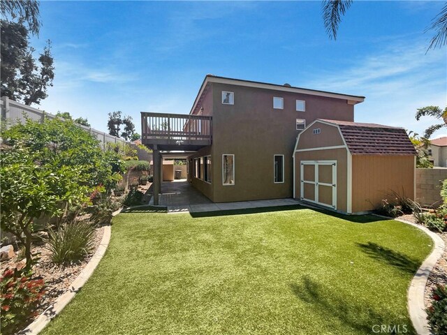 8424 Monique Ct, Riverside, CA 92508 - back of house with a wooden deck and a patio