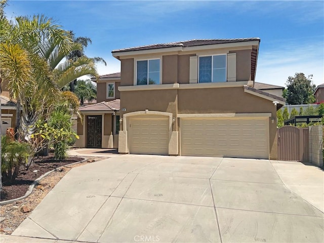 8424 Monique Ct, Riverside, CA 92508 - view of front of property with stucco siding, a garage, concrete driveway, and a tile roof