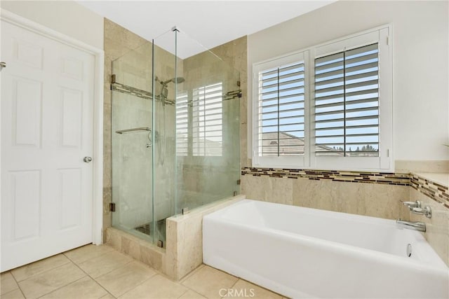 870 E Bermuda Dunes Ct, Ontario, CA 91761 - full bath with tile patterned floors, a shower stall, and a bath