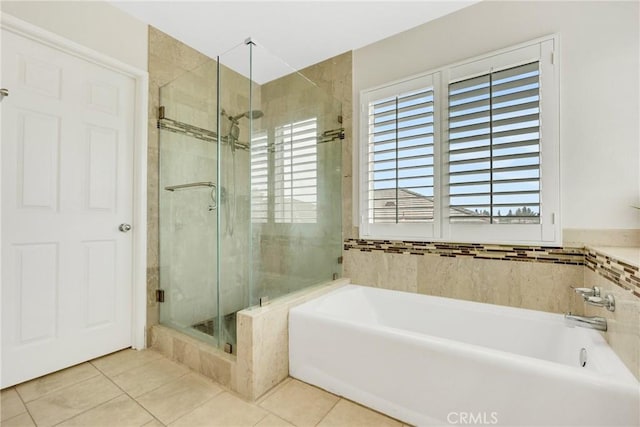 870 E Bermuda Dunes Ct, Ontario, CA 91761 - full bathroom featuring a garden tub, a stall shower, and tile patterned floors