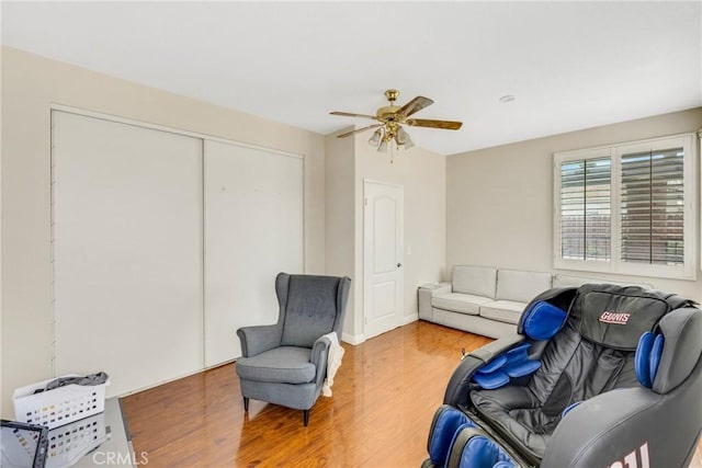 870 E Bermuda Dunes Ct, Ontario, CA 91761 - sitting room with light wood finished floors and ceiling fan