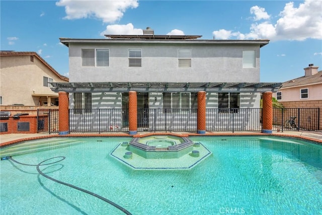 870 E Bermuda Dunes Ct, Ontario, CA 91761 - view of swimming pool featuring a pergola, a pool with connected hot tub, fence, and exterior kitchen