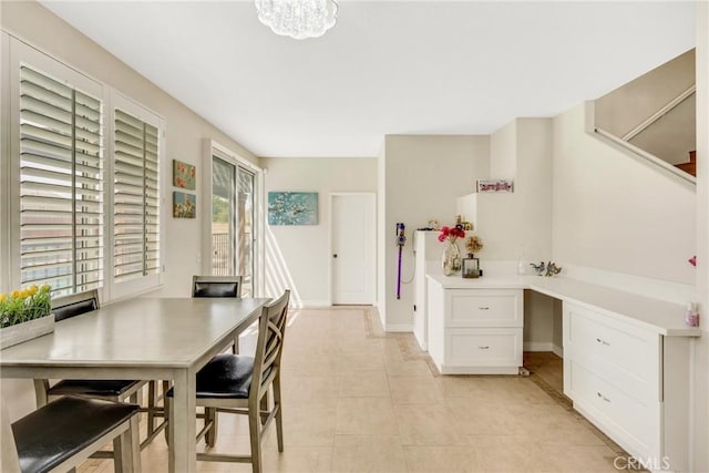870 E Bermuda Dunes Ct, Ontario, CA 91761 - dining area featuring light tile patterned flooring and baseboards