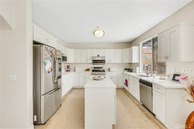 870 E Bermuda Dunes Ct, Ontario, CA 91761 - kitchen with stainless steel appliances, a sink, a kitchen island, light countertops, and white cabinets