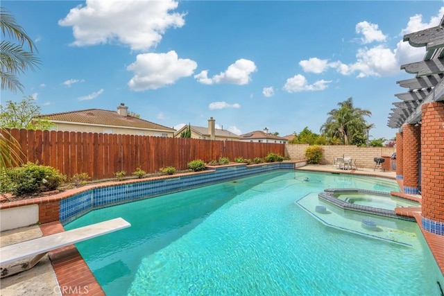870 E Bermuda Dunes Ct, Ontario, CA 91761 - view of pool featuring a fenced backyard, a diving board, and a pool with connected hot tub