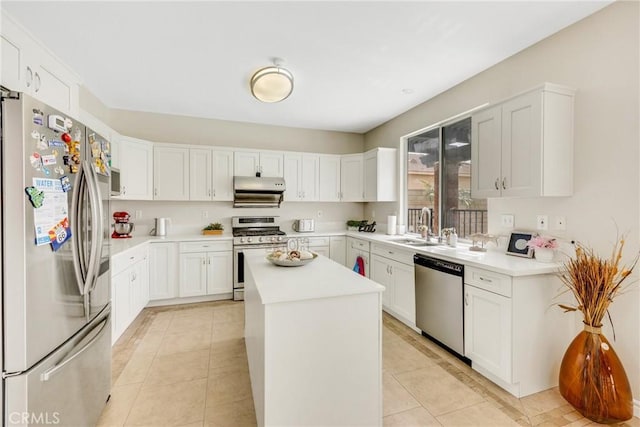 870 E Bermuda Dunes Ct, Ontario, CA 91761 - kitchen featuring stainless steel appliances, a sink, light countertops, a center island, and white cabinets