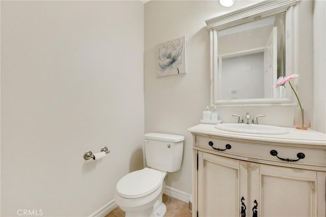 870 E Bermuda Dunes Ct, Ontario, CA 91761 - half bath with vanity, toilet, and baseboards