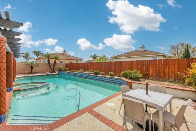 870 E Bermuda Dunes Ct, Ontario, CA 91761 - view of swimming pool with a pool with connected hot tub, a fenced backyard, a patio area, and outdoor dining space