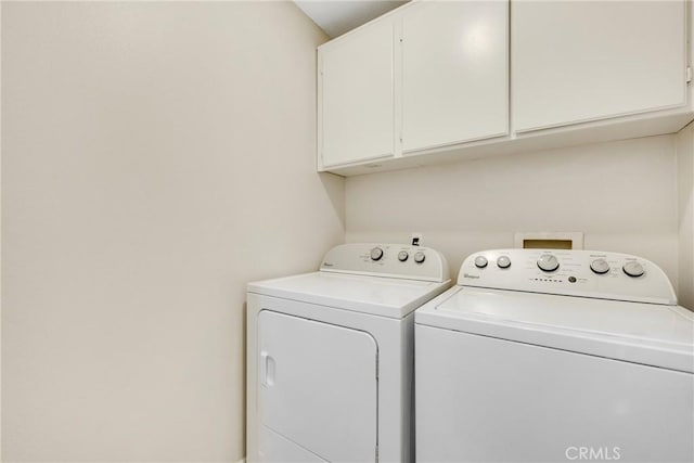 870 E Bermuda Dunes Ct, Ontario, CA 91761 - washroom featuring cabinet space and separate washer and dryer
