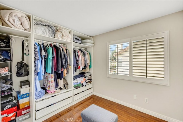 870 E Bermuda Dunes Ct, Ontario, CA 91761 - spacious closet featuring wood finished floors