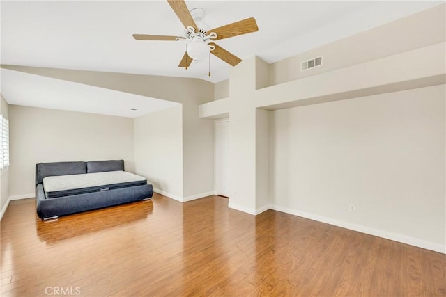 870 E Bermuda Dunes Ct, Ontario, CA 91761 - living area featuring wood finished floors, lofted ceiling, a ceiling fan, and baseboards