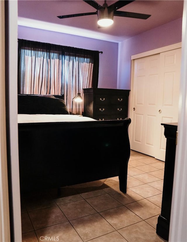 25657 Tamarisk St, Barstow, CA 92311 - bedroom with tile patterned flooring and a ceiling fan