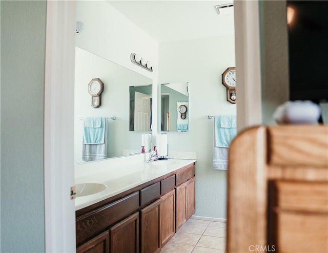 25657 Tamarisk St, Barstow, CA 92311 - bathroom with tile patterned flooring and double vanity