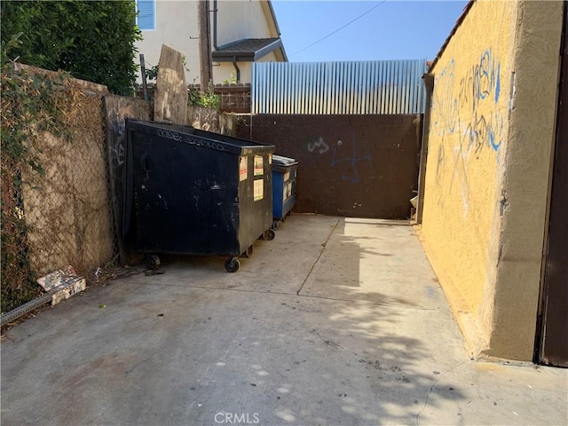 view of patio featuring fence