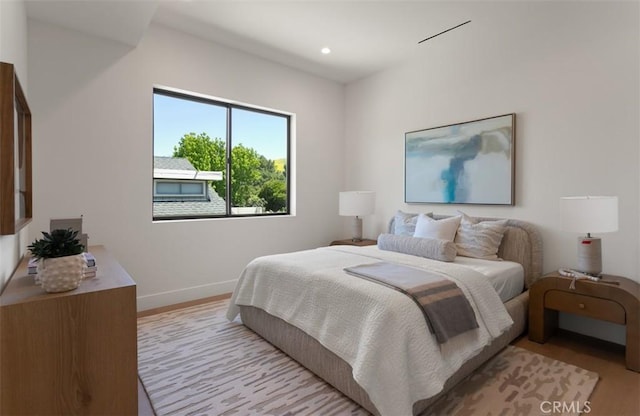 5772 Sierra Casa Rd, Irvine, CA 92603 - bedroom featuring wood finished floors, baseboards, and recessed lighting