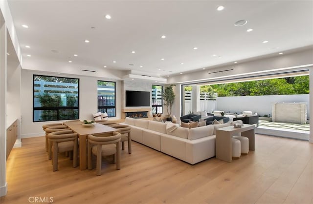 5772 Sierra Casa Rd, Irvine, CA 92603 - living area featuring light wood-style floors, recessed lighting, and healthy amount of natural light