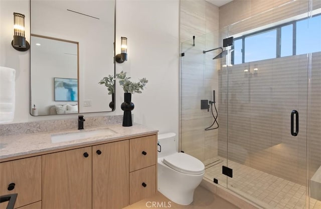 5772 Sierra Casa Rd, Irvine, CA 92603 - bathroom with vanity, toilet, and a stall shower