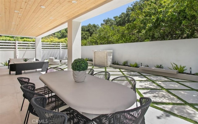 5772 Sierra Casa Rd, Irvine, CA 92603 - fenced backyard with a patio, outdoor dining space, and an outdoor living space