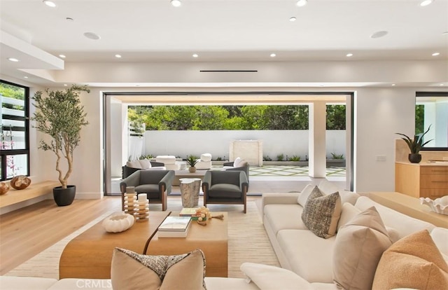 5772 Sierra Casa Rd, Irvine, CA 92603 - living room featuring recessed lighting and wood finished floors