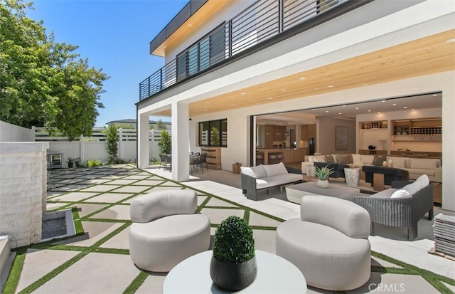 5772 Sierra Casa Rd, Irvine, CA 92603 - view of patio with an outdoor living space, a balcony, outdoor dining area, and area for grilling
