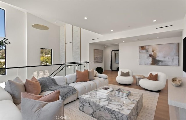 5772 Sierra Casa Rd, Irvine, CA 92603 - living area with light wood-style floors and recessed lighting