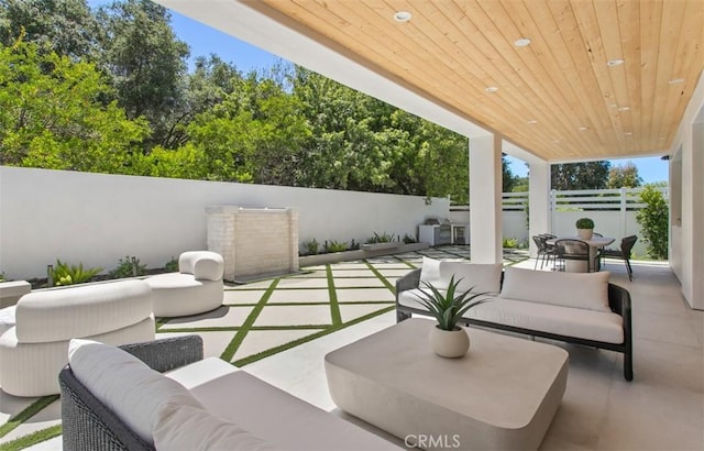 5772 Sierra Casa Rd, Irvine, CA 92603 - fenced backyard featuring outdoor lounge area, outdoor dining space, and a patio area