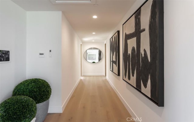 5772 Sierra Casa Rd, Irvine, CA 92603 - corridor with light wood-style flooring, recessed lighting, and baseboards