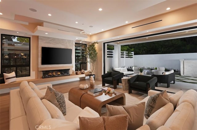 5772 Sierra Casa Rd, Irvine, CA 92603 - living room featuring recessed lighting and a large fireplace
