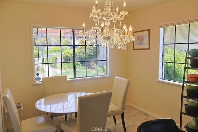 6508 Sandy Point Ct, Rancho Palos Verdes, CA 90275 - dining room featuring a chandelier, healthy amount of natural light, and light tile patterned flooring