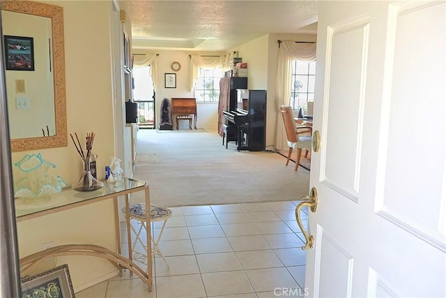 6508 Sandy Point Ct, Rancho Palos Verdes, CA 90275 - hallway with carpet, tile patterned flooring, and a textured ceiling