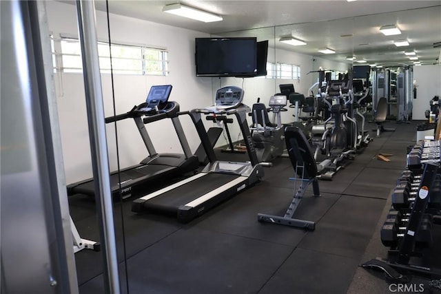 workout area featuring plenty of natural light
