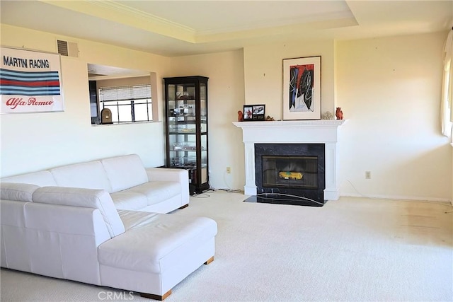 6508 Sandy Point Ct, Rancho Palos Verdes, CA 90275 - living area with carpet flooring, a tray ceiling, a fireplace with flush hearth, and ornamental molding