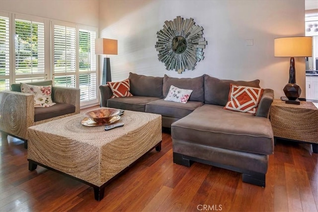 2049 Via Mariposa Unit E, Laguna Woods, CA 92637 - living area with wood-type flooring and healthy amount of natural light