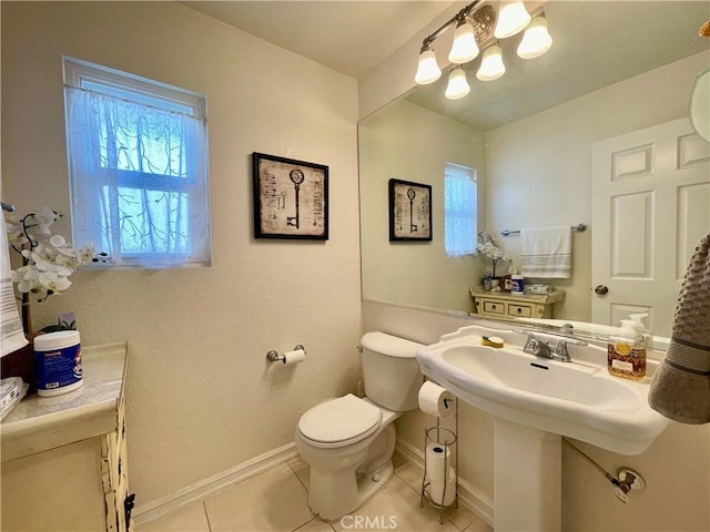 4166 Winged Foot Way, Chino Hills, CA 91709 - bathroom with baseboards, tile patterned floors, toilet, and a chandelier
