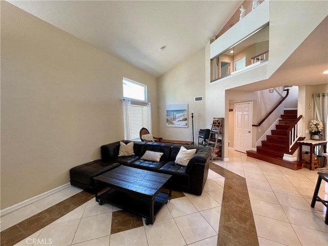 4166 Winged Foot Way, Chino Hills, CA 91709 - living room featuring tile patterned floors, stairs, high vaulted ceiling, and baseboards