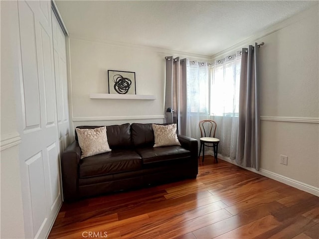 4166 Winged Foot Way, Chino Hills, CA 91709 - living room featuring wood finished floors, crown molding, and baseboards