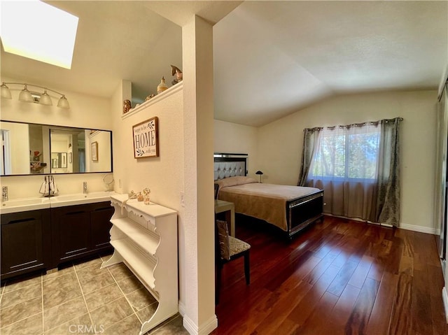 4166 Winged Foot Way, Chino Hills, CA 91709 - bedroom featuring vaulted ceiling, light wood-style floors, a skylight, and baseboards