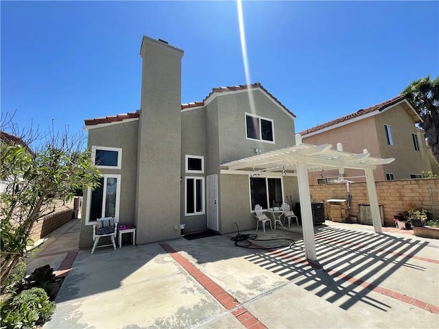 4166 Winged Foot Way, Chino Hills, CA 91709 - rear view of house featuring a pergola, stucco siding, fence, and a patio