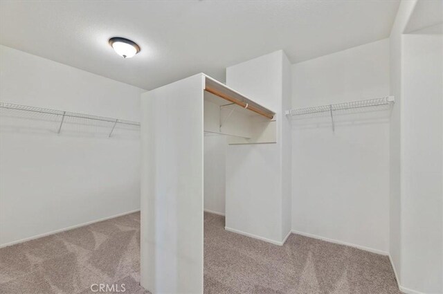 8167 Faircrest Rd, Riverside, CA 92508 - spacious closet with carpet flooring