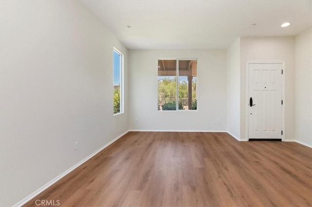 8167 Faircrest Rd, Riverside, CA 92508 - unfurnished room with wood finished floors, baseboards, and recessed lighting