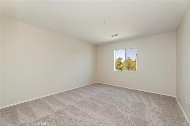 8167 Faircrest Rd, Riverside, CA 92508 - empty room with light colored carpet and baseboards